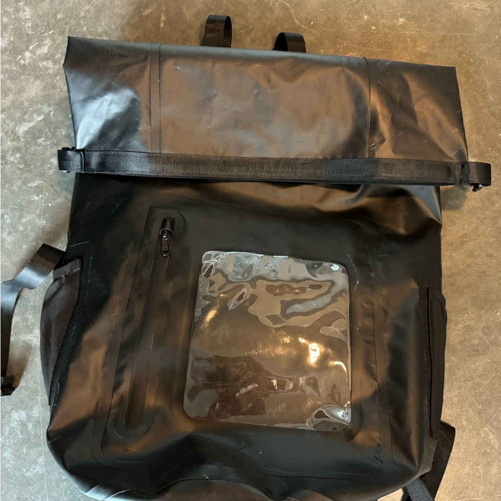 Sleek Black Roll-Top Backpack